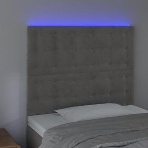 Sänggavel LED ljusgrå 80x5x118/128 cm sammet